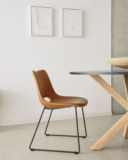 Zahara chair in brown polyurethane with steel legs and black finish FSC 100%