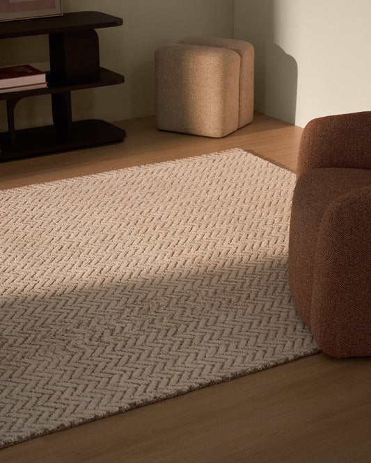 Calira beige woven jacquard wool rug 230 x 160cm