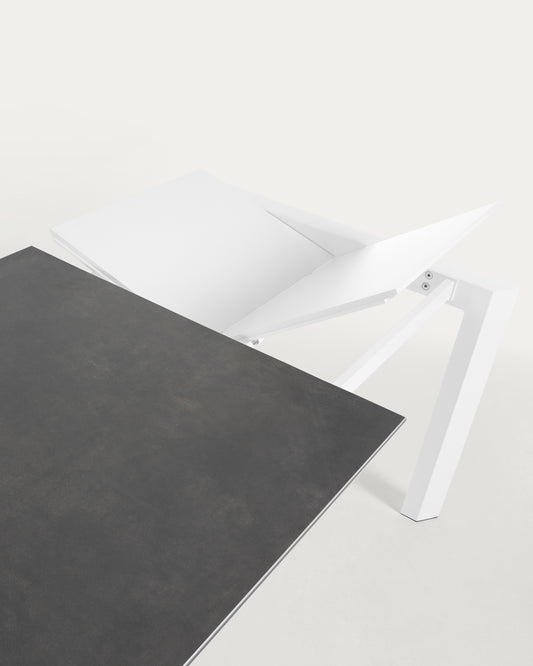 Axis porcelain pull-out table in Volcano Rock finish with white steel legs 120 (180) cm