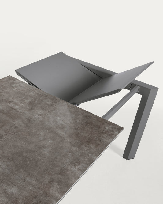 Axis ceramic table with axis extension in Vulcano Ceniza finish, anthracite steel legs 120 (180) cm