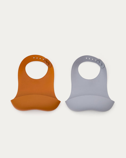 Lily set of two bibs in orange and blue silicone