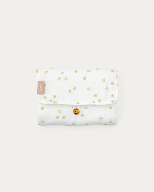 Olna travel changing mat made of 100% cotton with a sun print