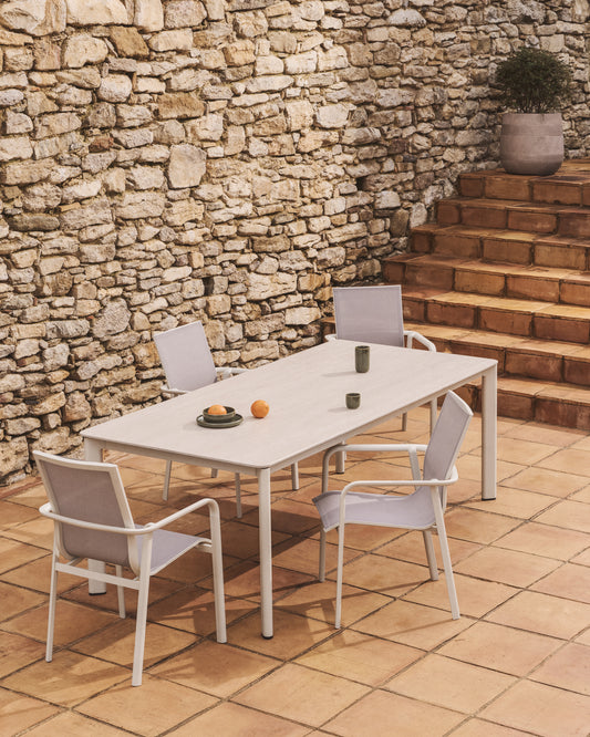 Anafi table made of sintered stone and aluminum in beige color, 220 x 100 cm