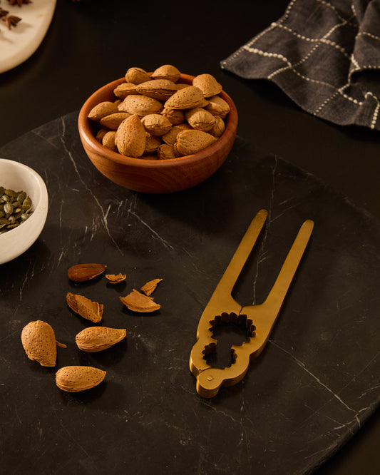 A close nut made of gold colored stainless steel