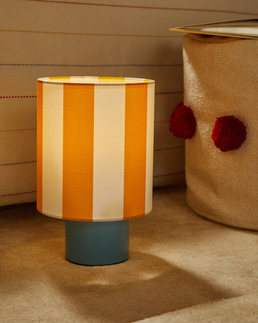 Ciral metal table lamp in blue color.