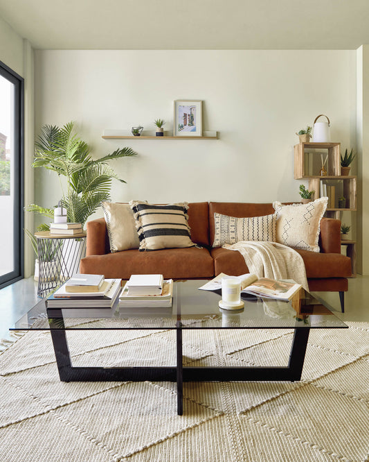 Plam coffee table made of black glass 120 x 70 cm