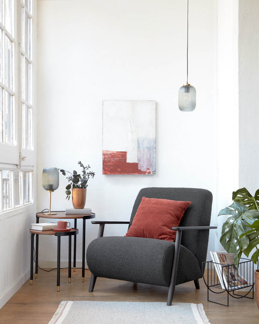 Hestia table lamp made of metal with brass and gray glass finish