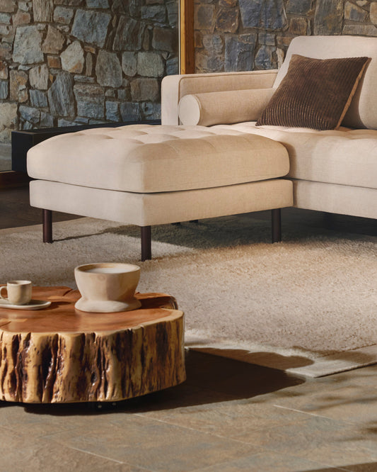 Tavine coffee table in solid acacia with bleached finish and wheels Ø65 cm