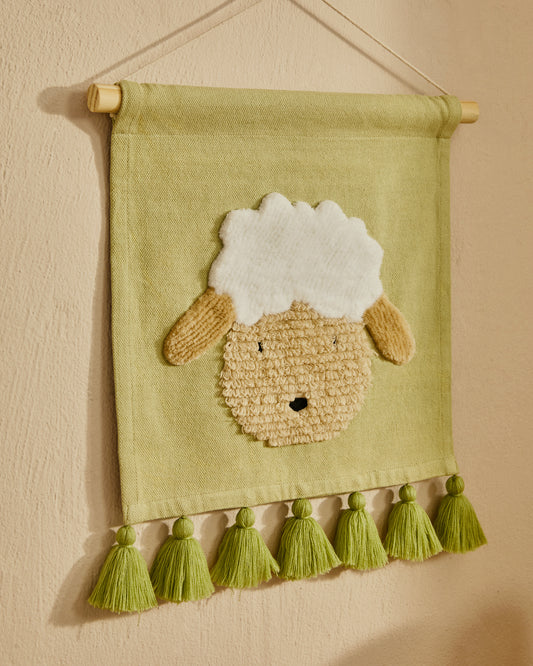 Milo wall tapestry made of green cotton with sheepskin and green fringes