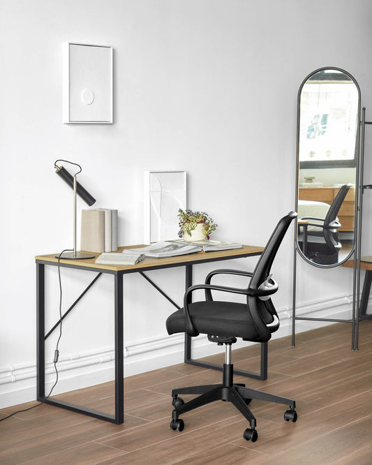 Melva office chair in black color and steel legs in black color