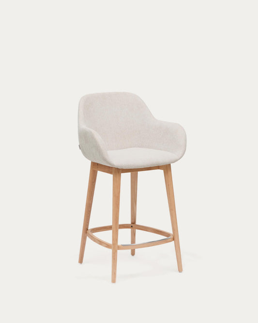 Horse stool in beige with solid ash wood legs in light finish, 65 cm