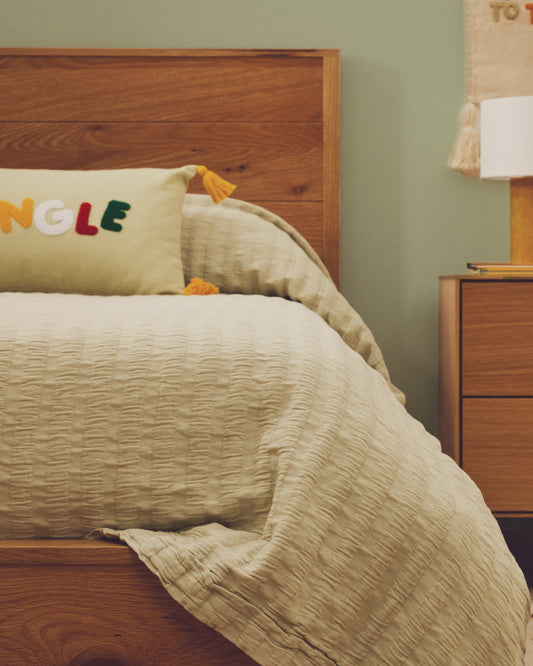 Rilune 100% cotton bedspread with light green embossed stripes for a child's bed