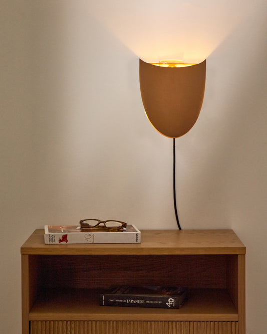 Nibla wall lamp made of metal with a terracotta effect
