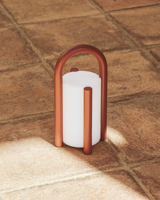 Small portable Leros table lamp made of polyethylene and terracotta color with metal part