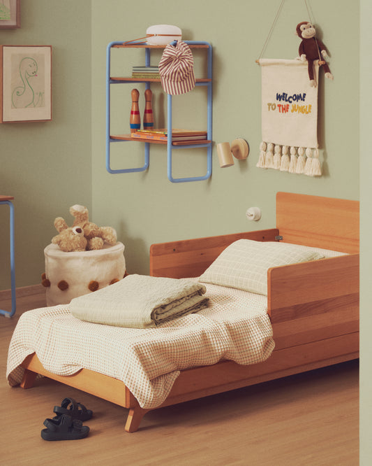 Wufy 100% cotton waffle cover with multi-colored stripes for a child's bed