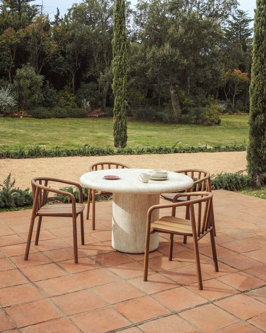 Drasi round cement table with travertine effect finish Ø 122 cm