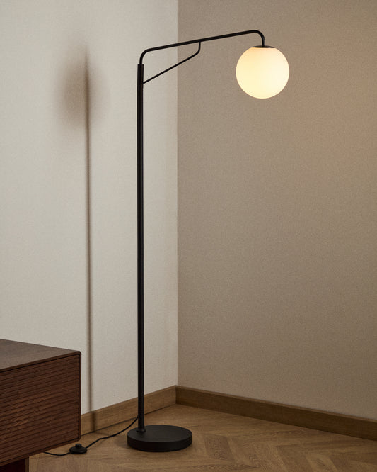 Eilo floor lamp made of black steel with a frosted glass ball