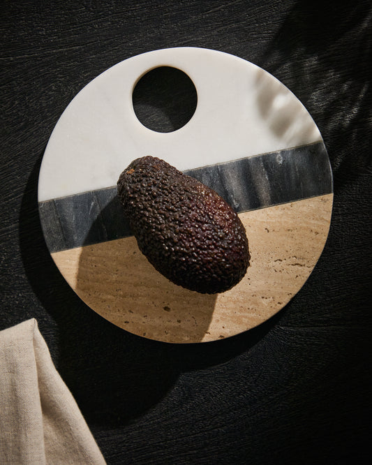Nivol round serving board made of black and white marble and travertine