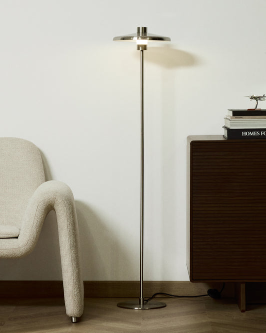Nuvira floor lamp with a light gray brushed metal base