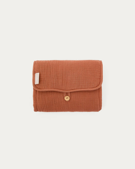 Olna travel changing mat in 100% terracotta cotton 