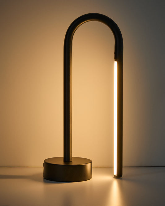 Bow black aluminum portable table lamp