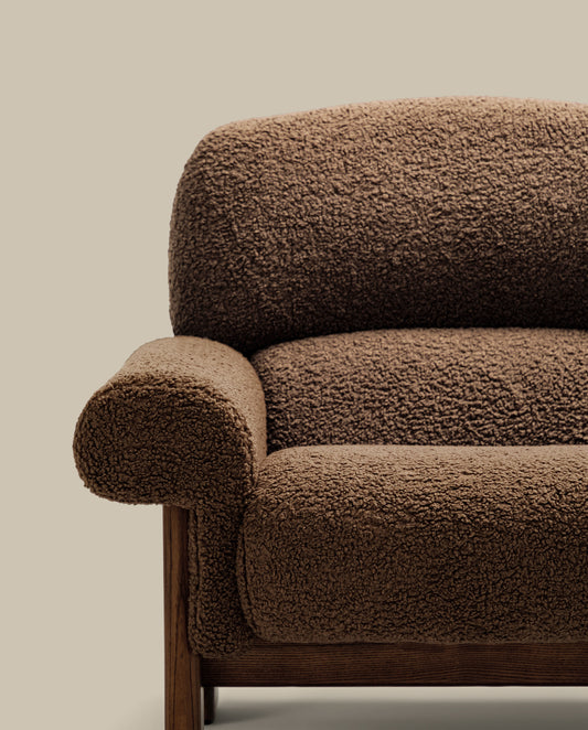 Nema armchair in taupe bouclé with solid ash wood legs in a walnut finish FSC 100%